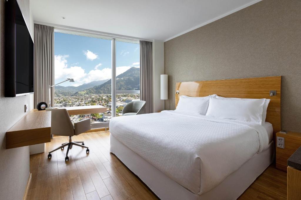 Voodi või voodid majutusasutuse Four Points by Sheraton Panoramahaus Dornbirn toas