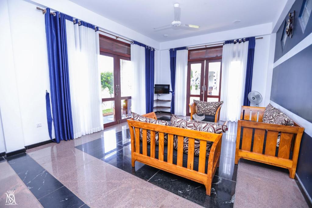 Posezení v ubytování Rivershore Villas