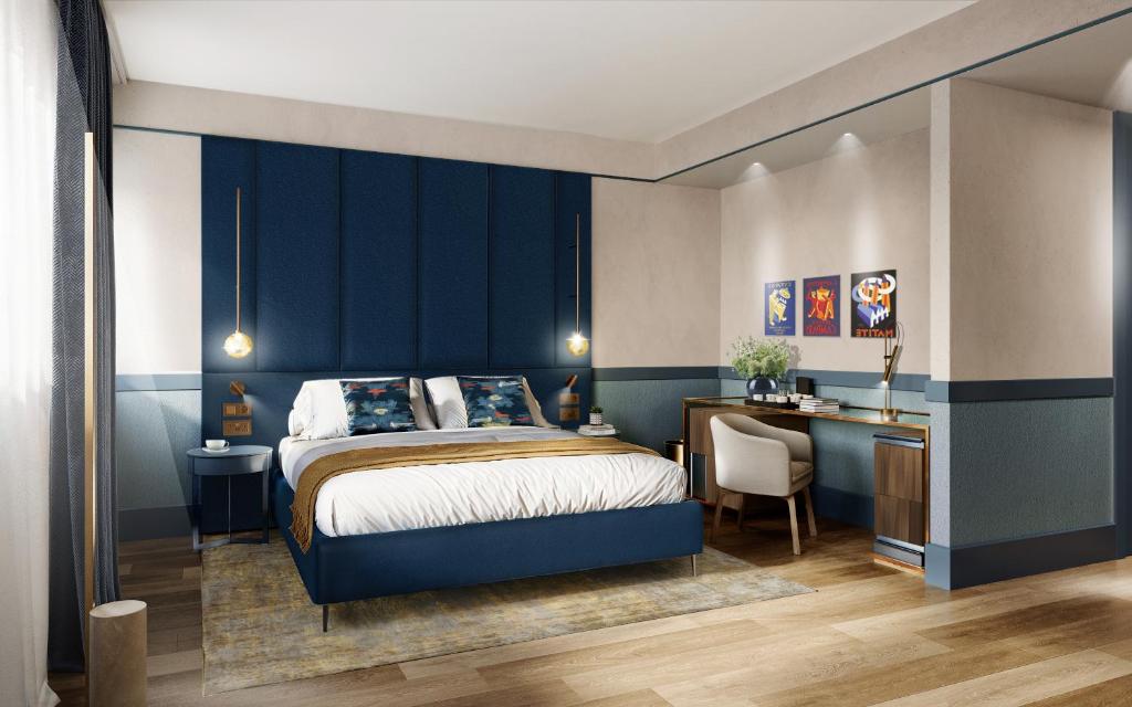 Postel nebo postele na pokoji v ubytování NEMI Hotel