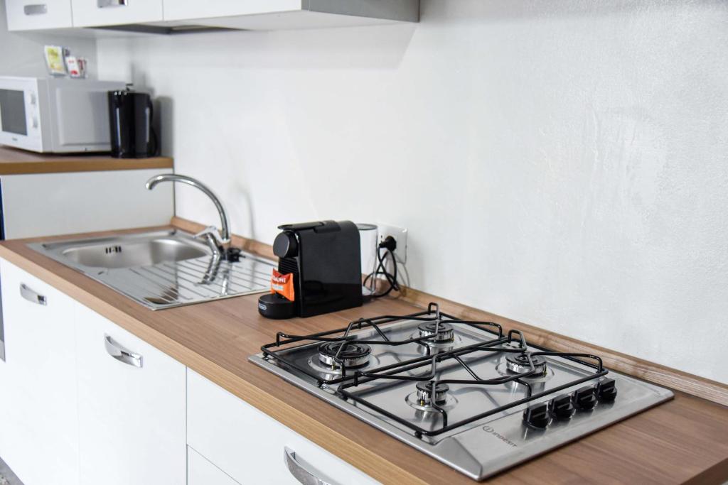 Kuchyň nebo kuchyňský kout v ubytování Appartamento Magnolia