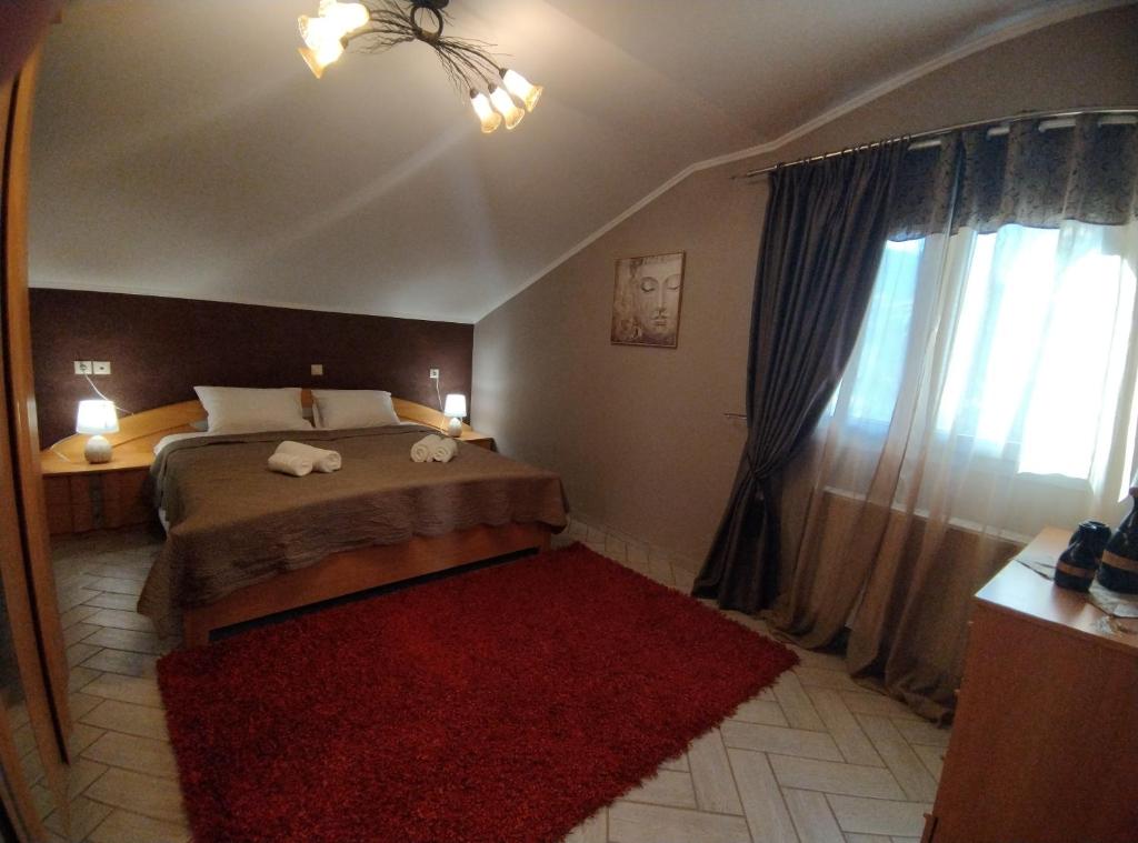 Postel nebo postele na pokoji v ubytování Mirabilia Guest House