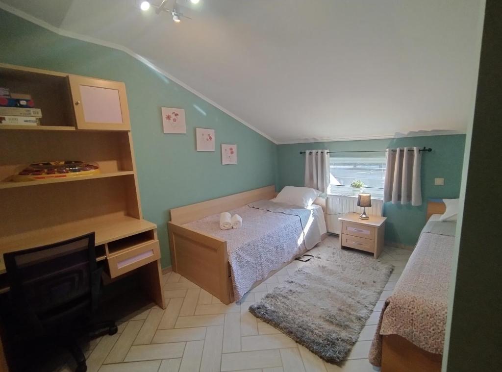 Postel nebo postele na pokoji v ubytování Mirabilia Guest House