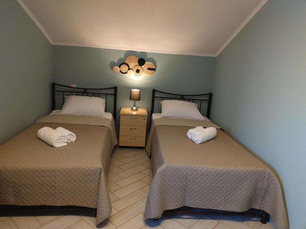 Postel nebo postele na pokoji v ubytování Mirabilia Guest House
