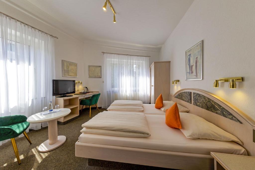 TV a/nebo společenská místnost v ubytování Hotel Brack