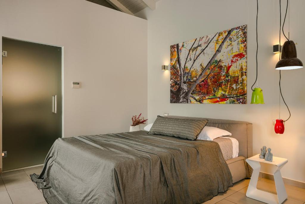 Postel nebo postele na pokoji v ubytování Braunis Horio Villas