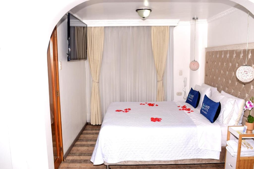 Postel nebo postele na pokoji v ubytování Lavid Hotel Kennedy