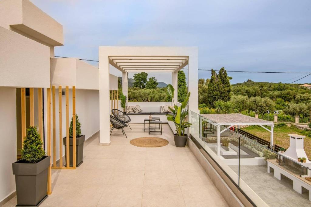 Fotografie z fotogalerie ubytování White Collection Villas & Suites - Pnoe Villa v destinaci Pandokrátor