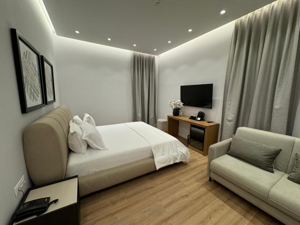 TV a/nebo společenská místnost v ubytování Hotel Vila Zeus