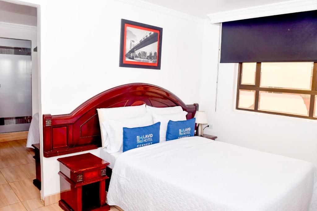 Postel nebo postele na pokoji v ubytování Lavid Hotel Kennedy