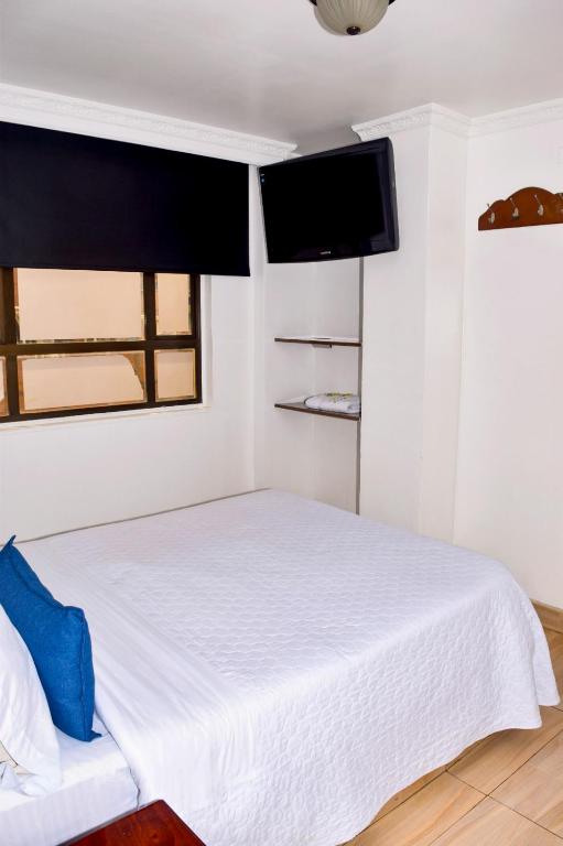Postel nebo postele na pokoji v ubytování Lavid Hotel Kennedy