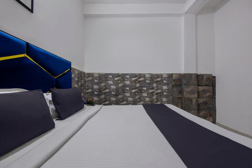 Postel nebo postele na pokoji v ubytování Hotel O Relax Inn