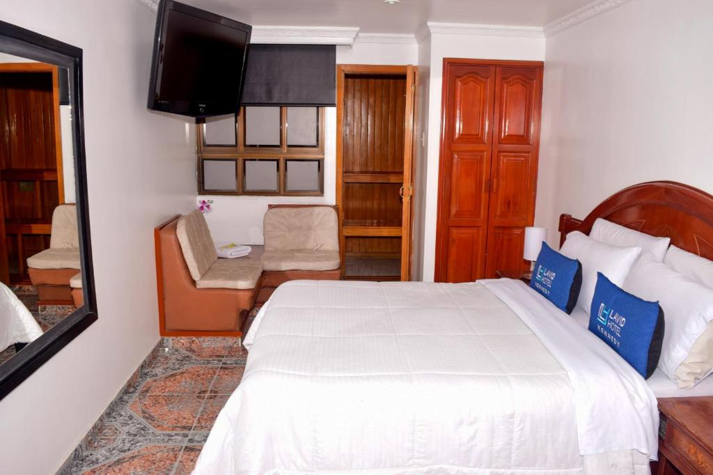 Postel nebo postele na pokoji v ubytování Lavid Hotel Kennedy