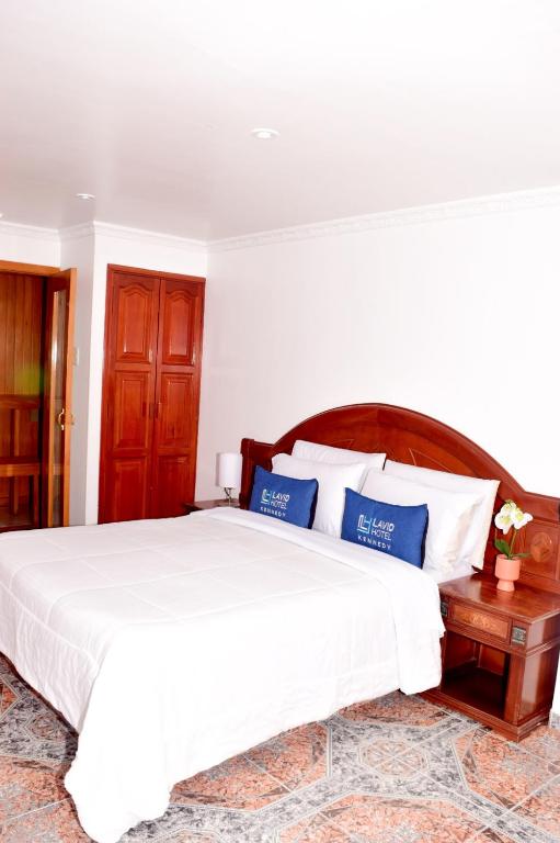 Postel nebo postele na pokoji v ubytování Lavid Hotel Kennedy