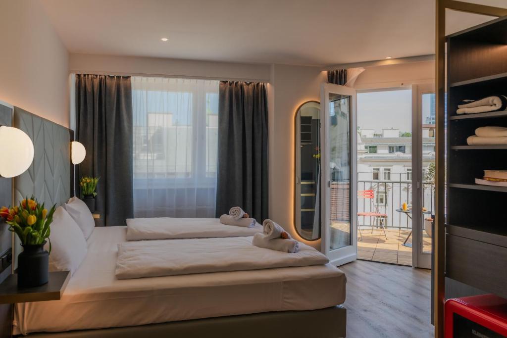 Postel nebo postele na pokoji v ubytování Florum Hotel