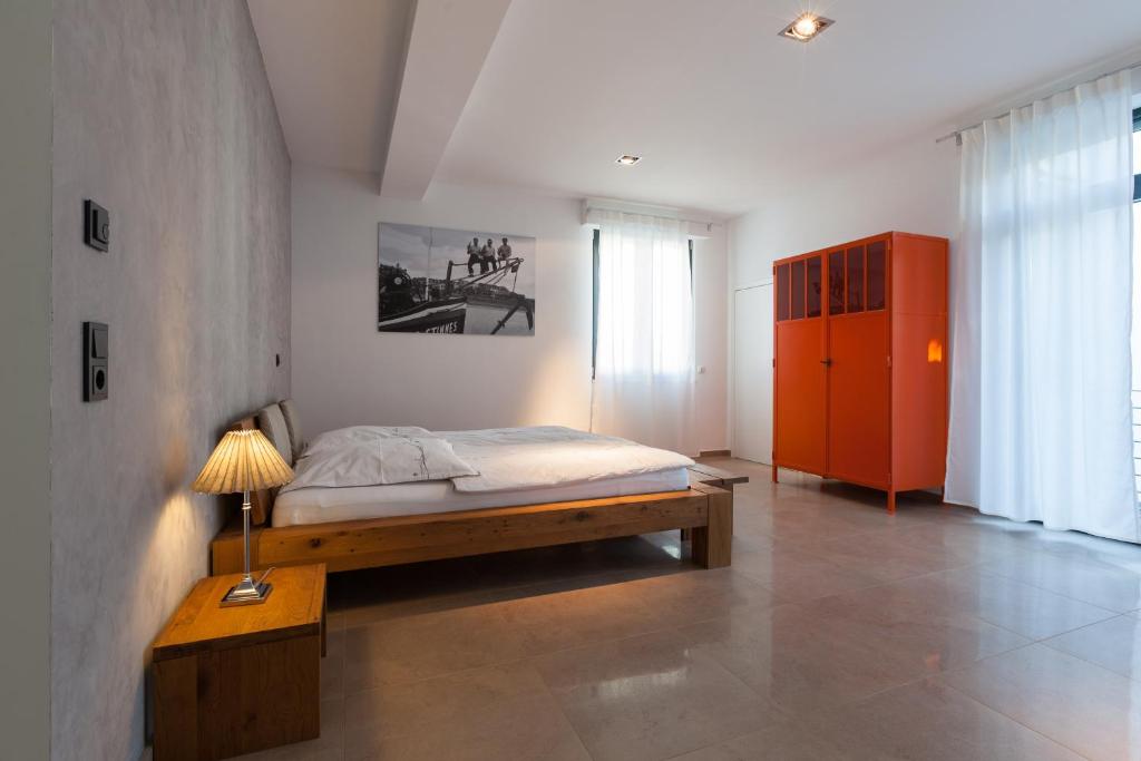 Postel nebo postele na pokoji v ubytování Guesthouse Altes Rathaus