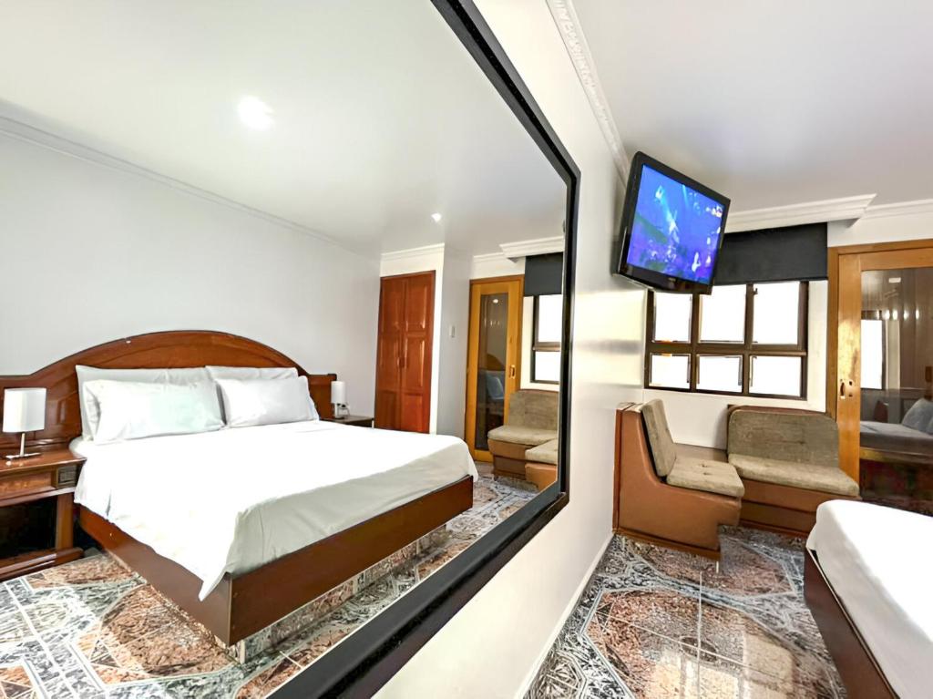 Postel nebo postele na pokoji v ubytování Lavid Hotel Kennedy