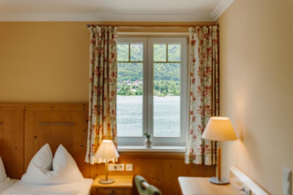 Posteľ alebo postele v izbe v ubytovaní Hotel Seerose