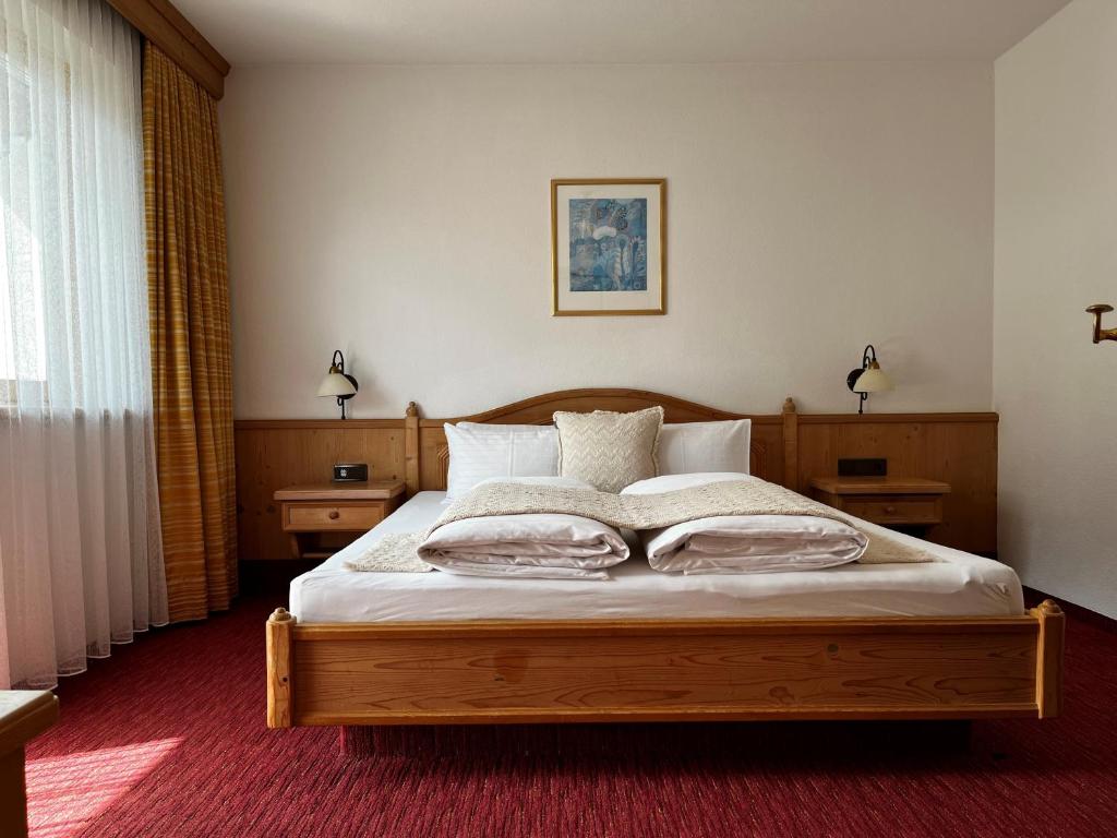Posteľ alebo postele v izbe v ubytovaní Appartements Maria Theresia