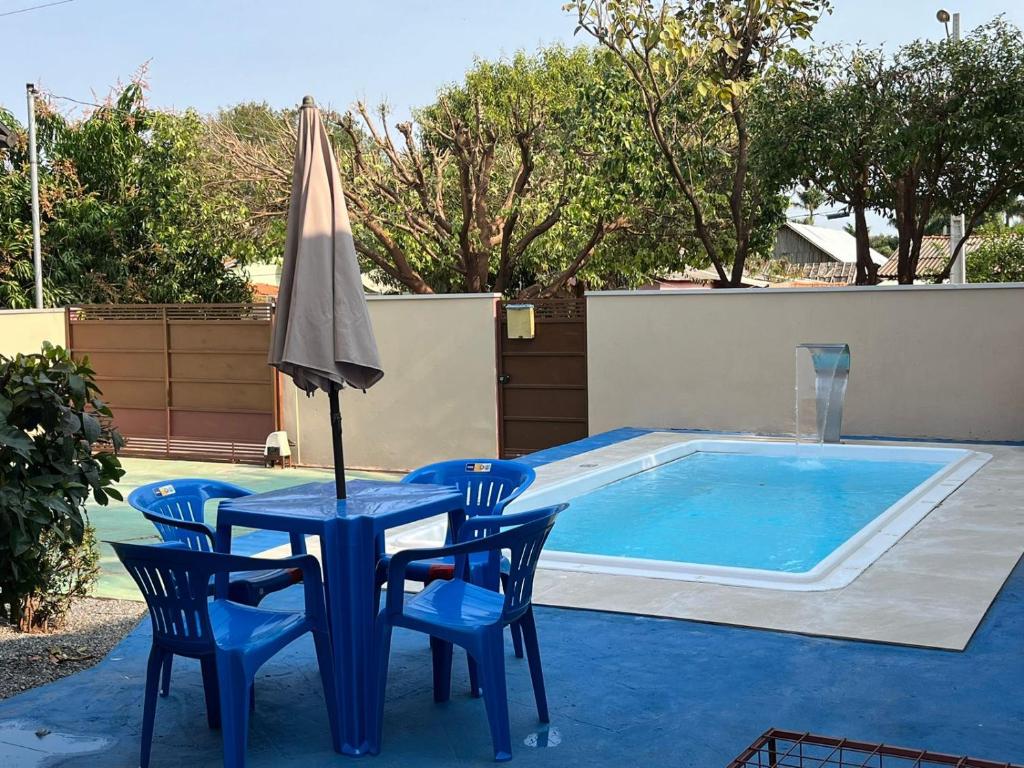 Πισίνα στο ή κοντά στο Casa de Temporada Ipê Rosa