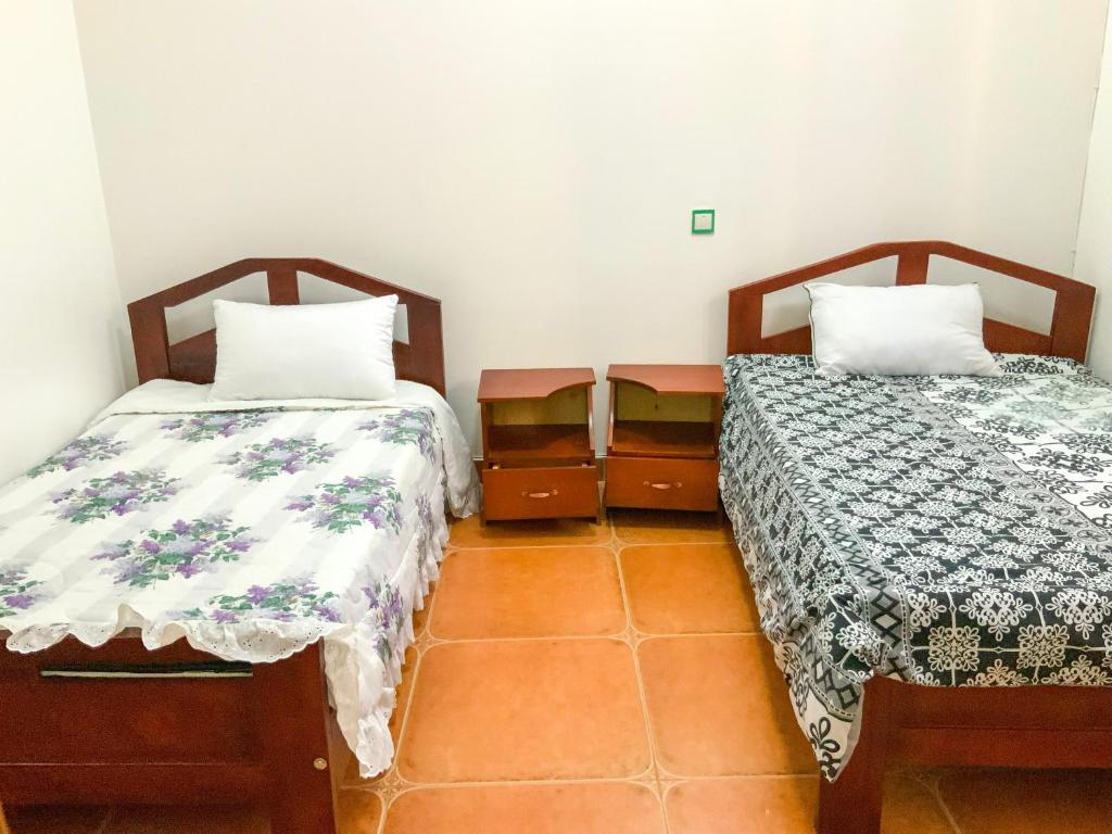 Postel nebo postele na pokoji v ubytování Hendo Hotel