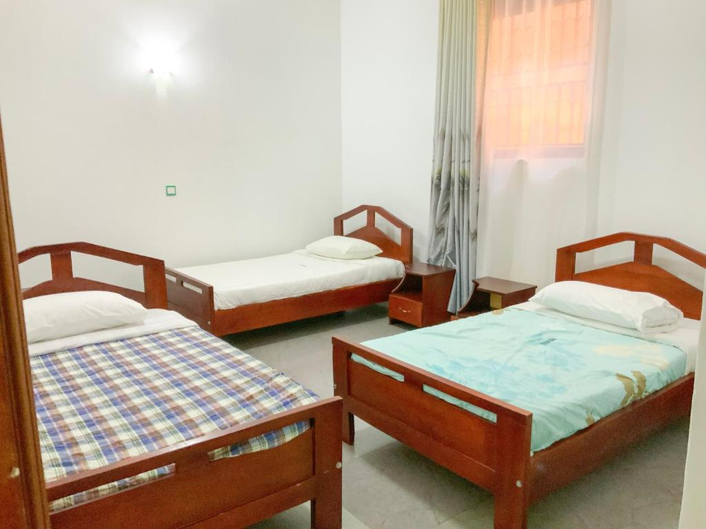 Postel nebo postele na pokoji v ubytování Hendo Hotel