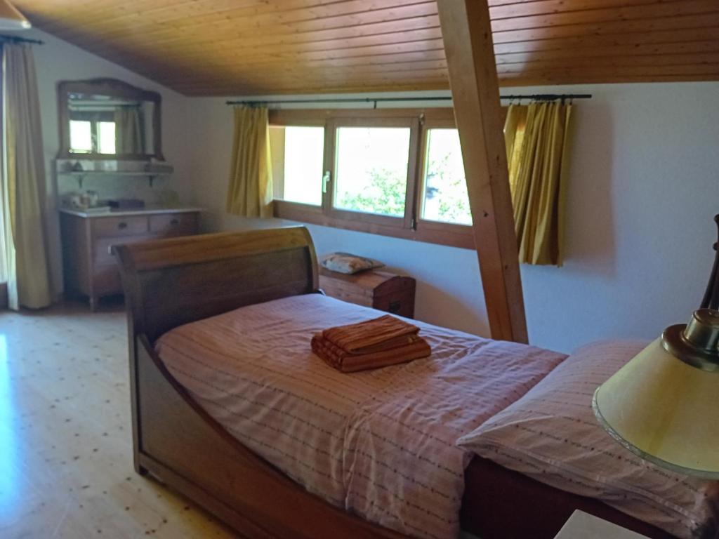 Postel nebo postele na pokoji v ubytování Chez Karine