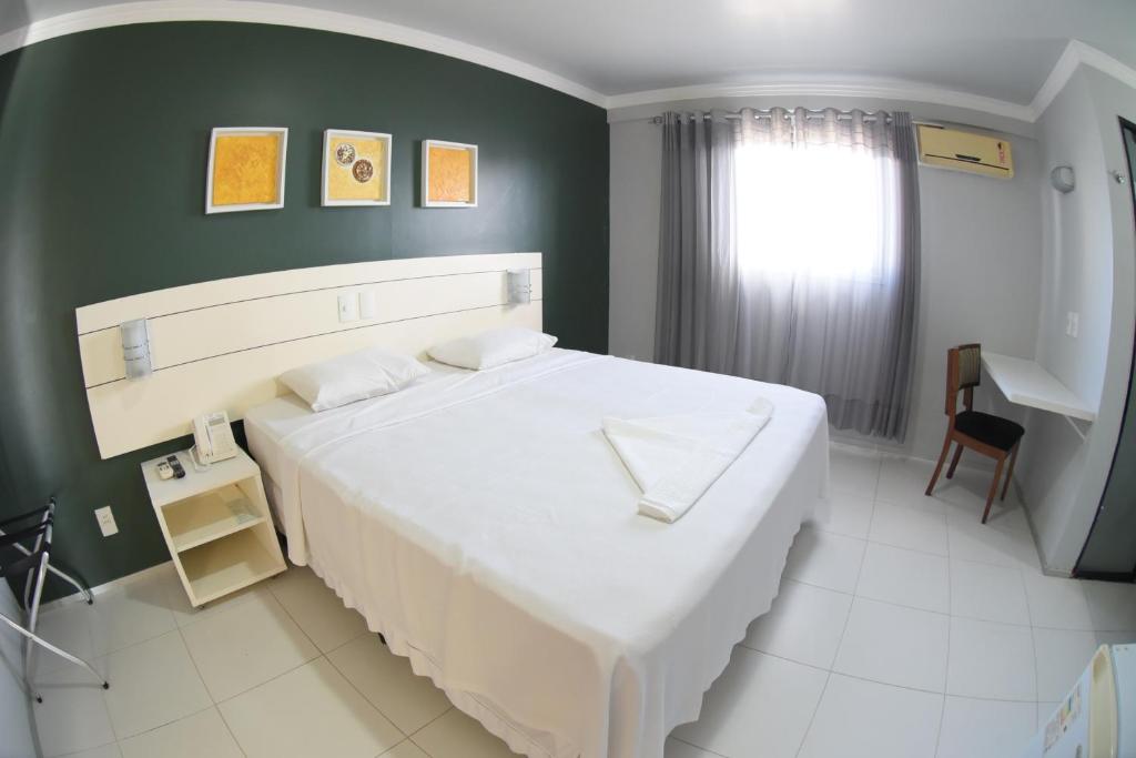 Postel nebo postele na pokoji v ubytování Veleiros Mar Hotel
