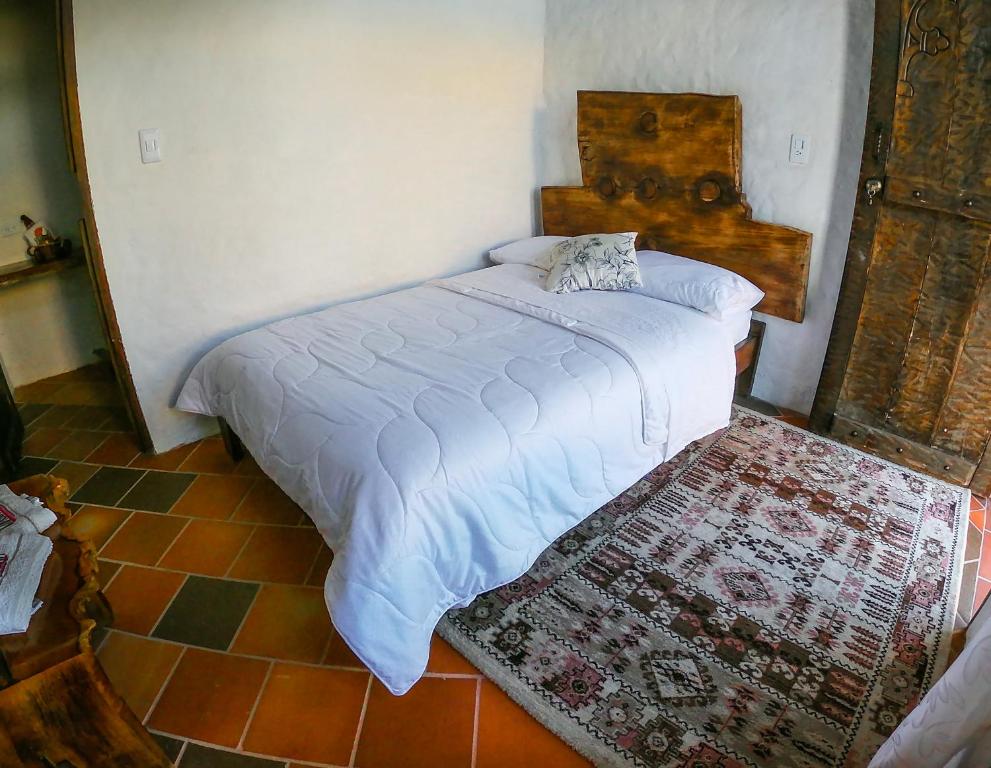Postel nebo postele na pokoji v ubytování Mirador del Magdalena Hotel y Glamping