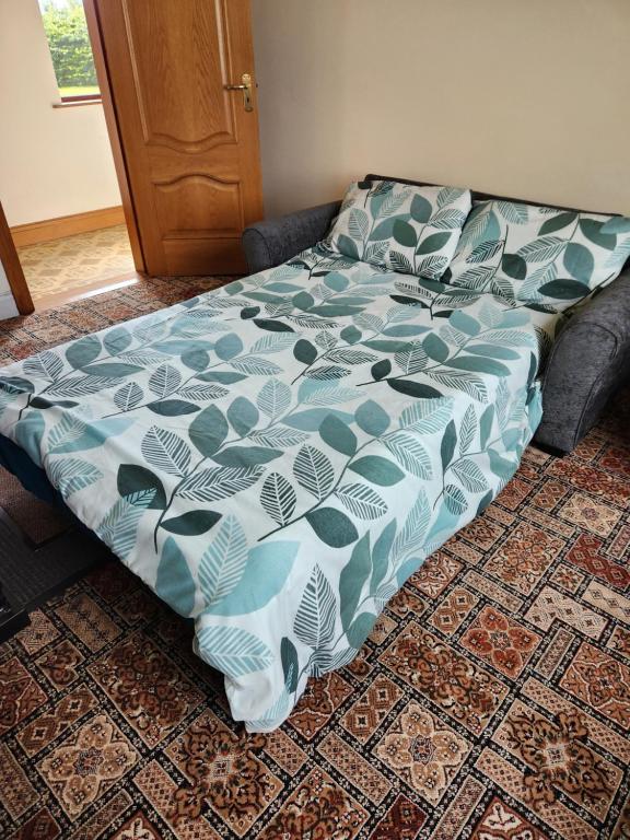 Postel nebo postele na pokoji v ubytování Swinford Country House