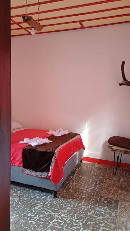 Postel nebo postele na pokoji v ubytování Hostal El Chili