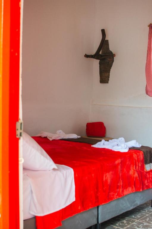 Postel nebo postele na pokoji v ubytování Hostal El Chili