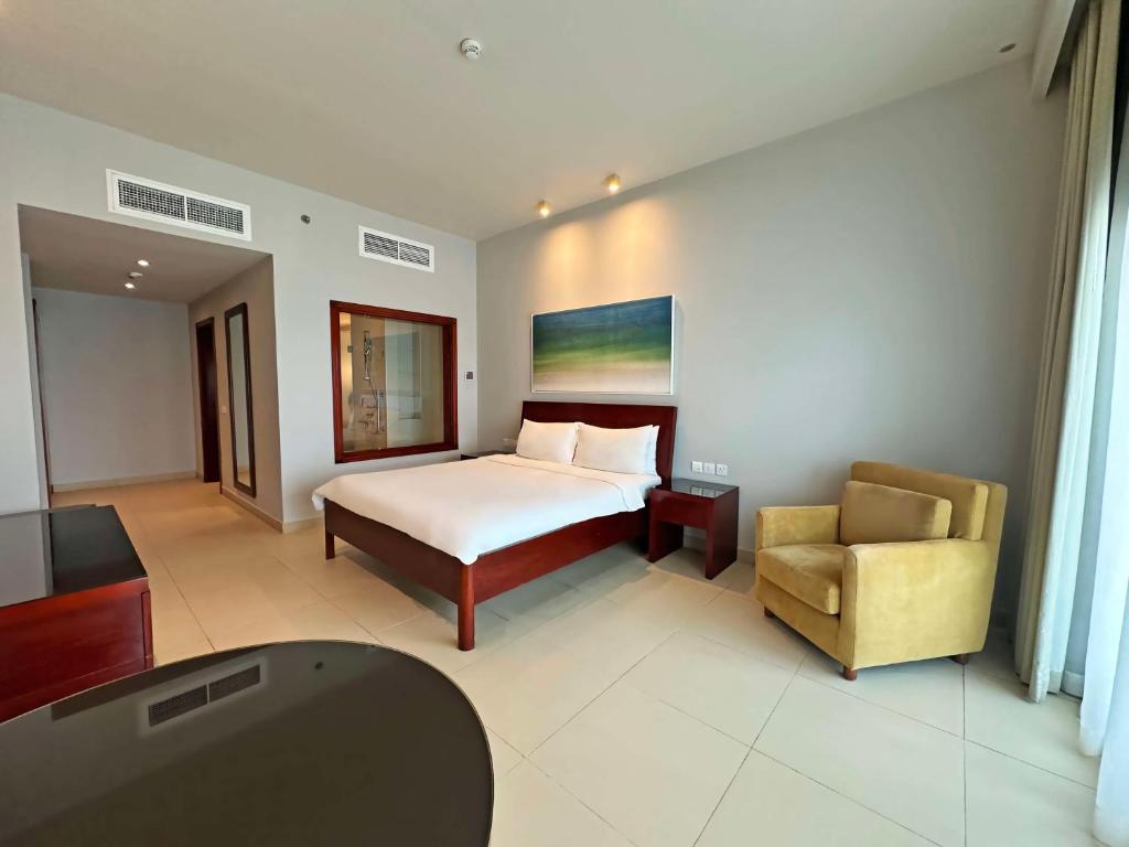 Postel nebo postele na pokoji v ubytování Radisson Blu Resort, Fujairah