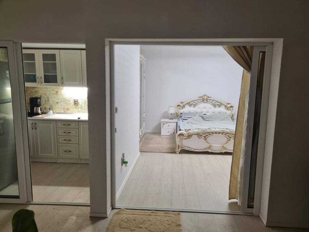 Ένα ή περισσότερα κρεβάτια σε δωμάτιο στο RDR Apartments