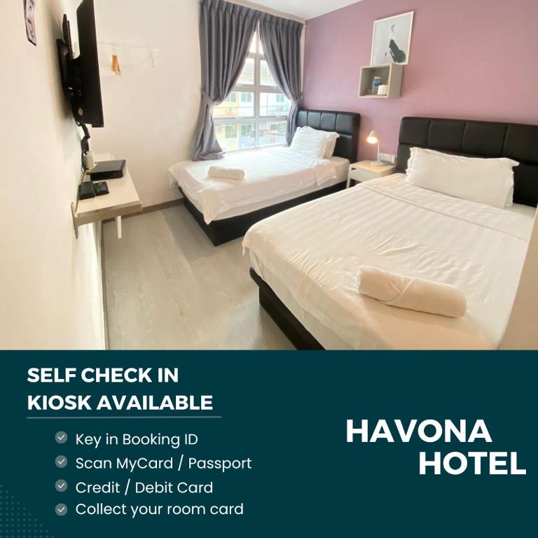 Postel nebo postele na pokoji v ubytování Havona hotel - Taman Tropika Kulai