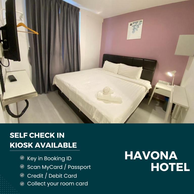Postel nebo postele na pokoji v ubytování Havona hotel - Taman Tropika Kulai