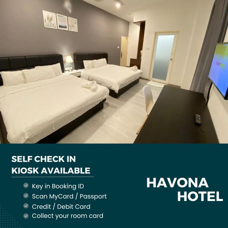 Postel nebo postele na pokoji v ubytování Havona hotel - Taman Tropika Kulai