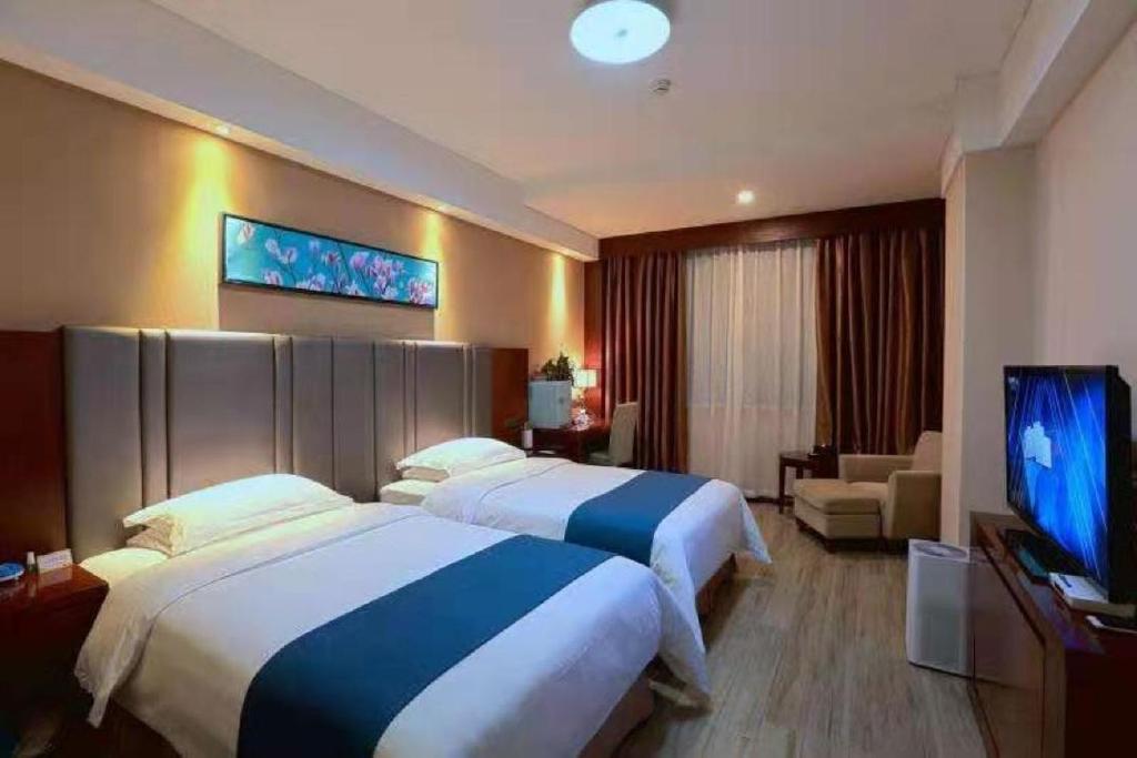 Postel nebo postele na pokoji v ubytování Bestway Hotel Xi'an
