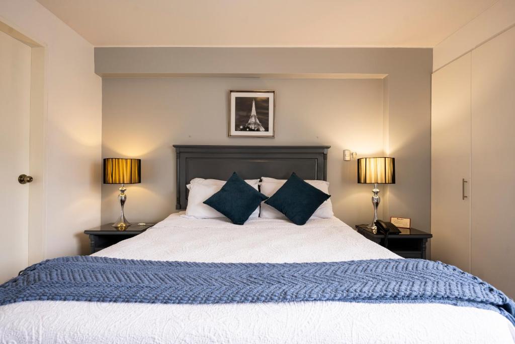 Postel nebo postele na pokoji v ubytování Apart Hotel San Martin
