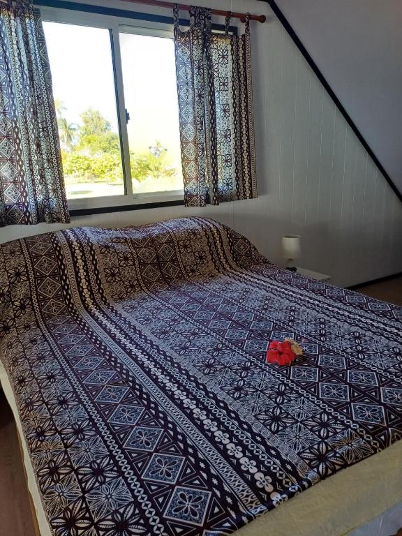 Postel nebo postele na pokoji v ubytování Villa VAIROARII Moorea