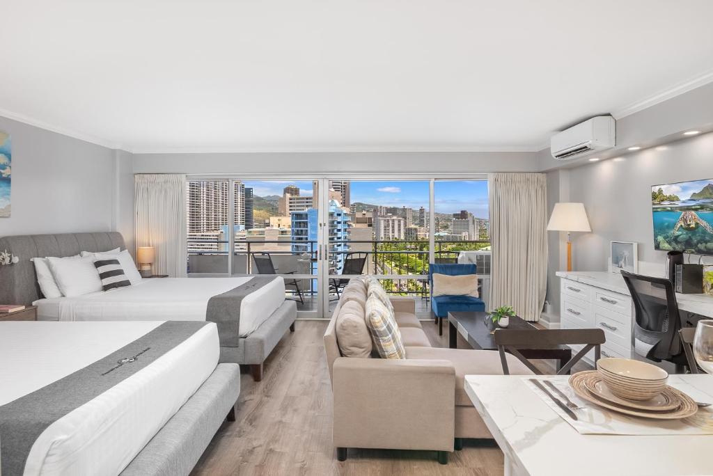 Ένα ή περισσότερα κρεβάτια σε δωμάτιο στο Waikiki City View at the Ilikai, Close to Beach