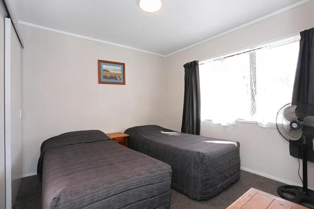 Letto o letti in una camera di Accommodation Gateway Motel