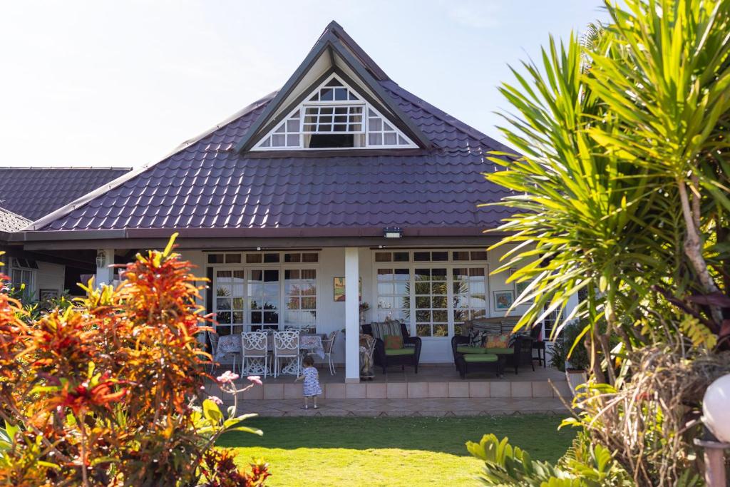 Garður fyrir utan Chambres d'hôtes - Côté mer - Tahiti Sunset Home
