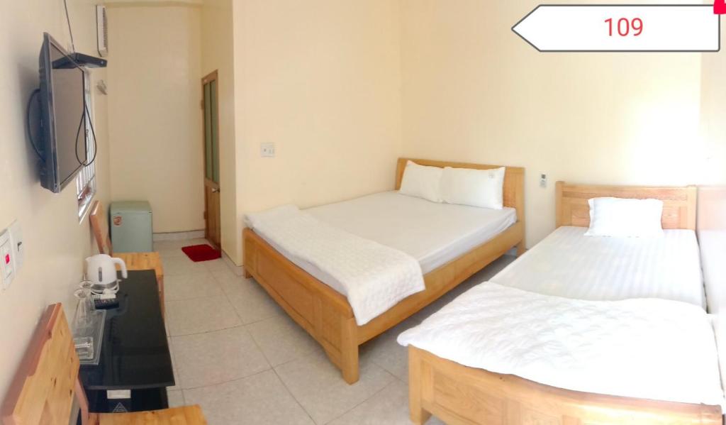 Homstay Sinh thái Cây Sung Mộc Châu - 带有湖景的三重房间