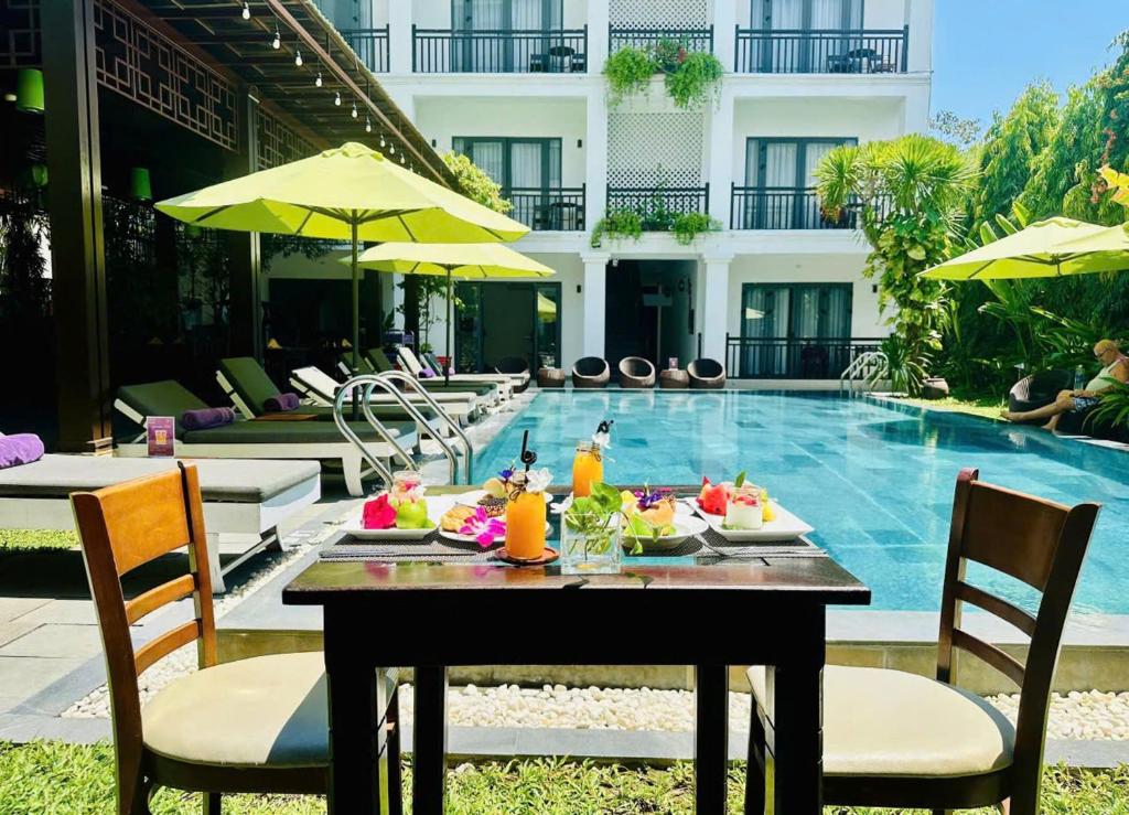 Bazén v ubytování White Lotus Hotel Hoian nebo v jeho okolí