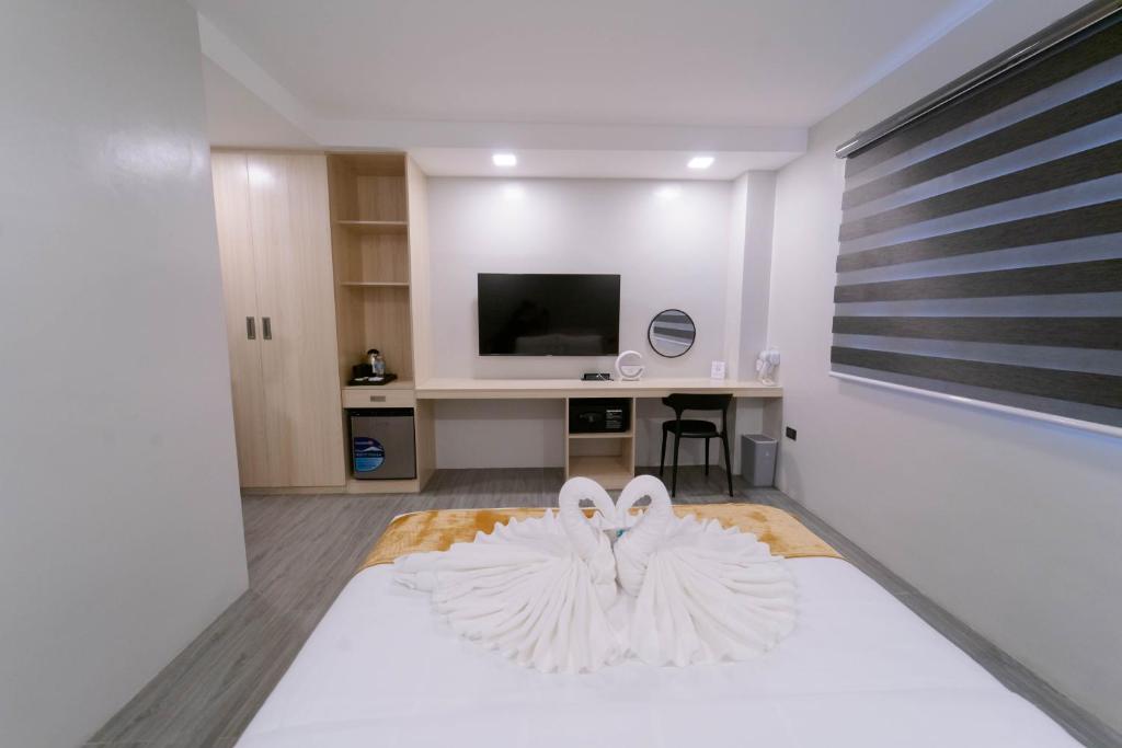 TV a/nebo společenská místnost v ubytování A Traveller's Inn