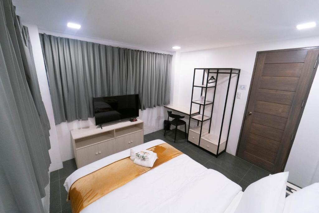 Postel nebo postele na pokoji v ubytování A Traveller's Inn