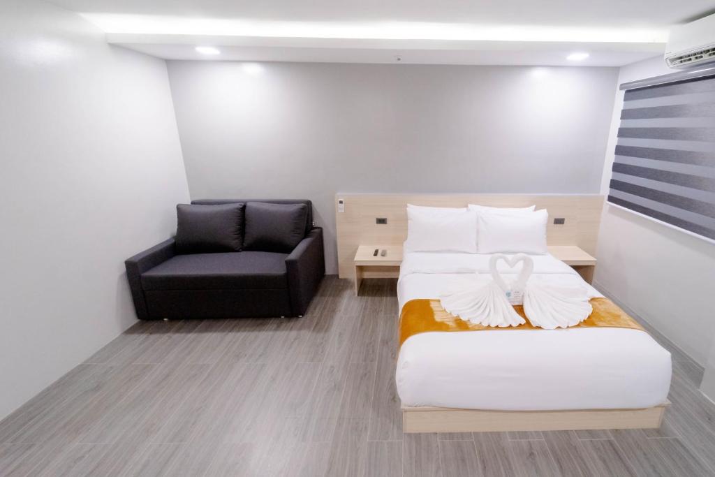 Postel nebo postele na pokoji v ubytování A Traveller's Inn