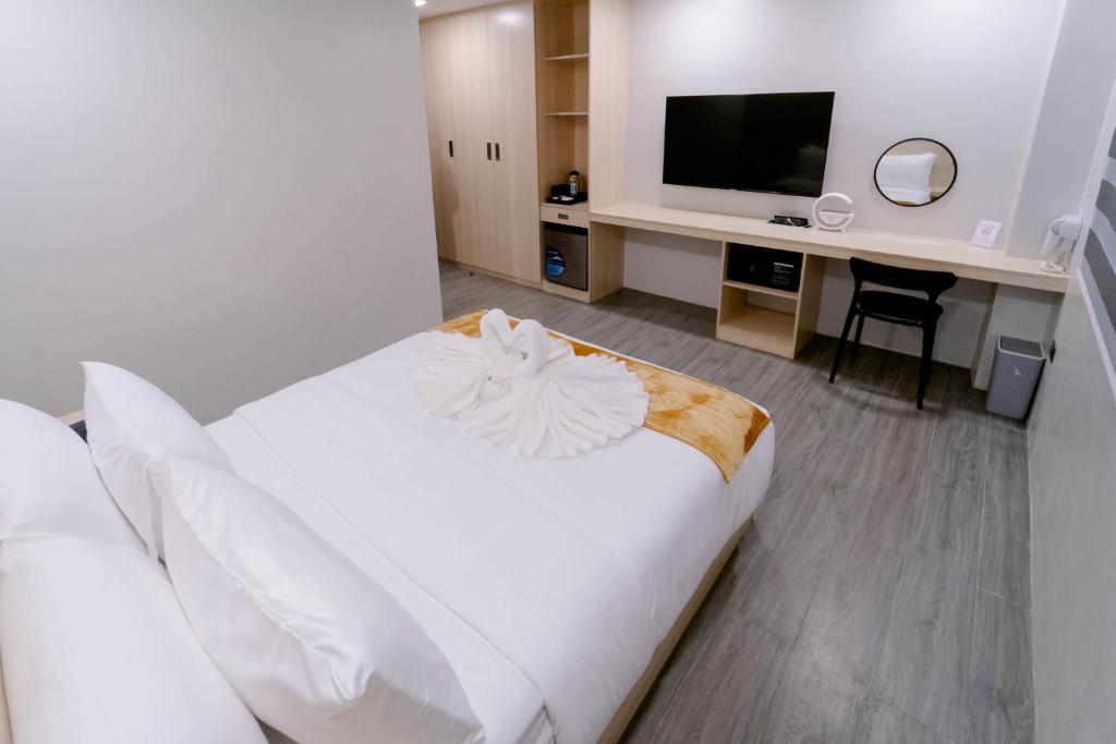 Postel nebo postele na pokoji v ubytování A Traveller's Inn