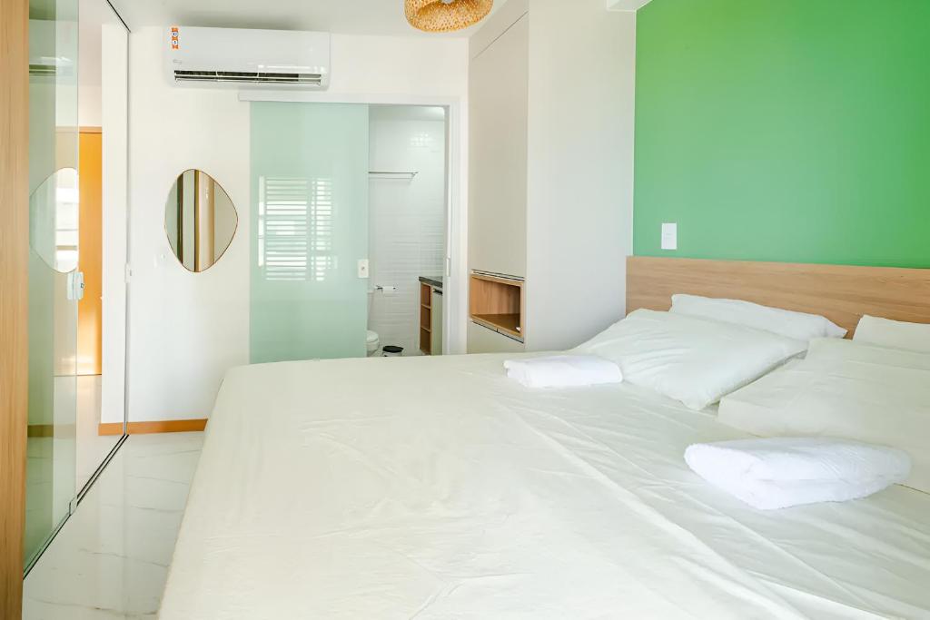 Cama ou camas em um quarto em Apartamento na Barra