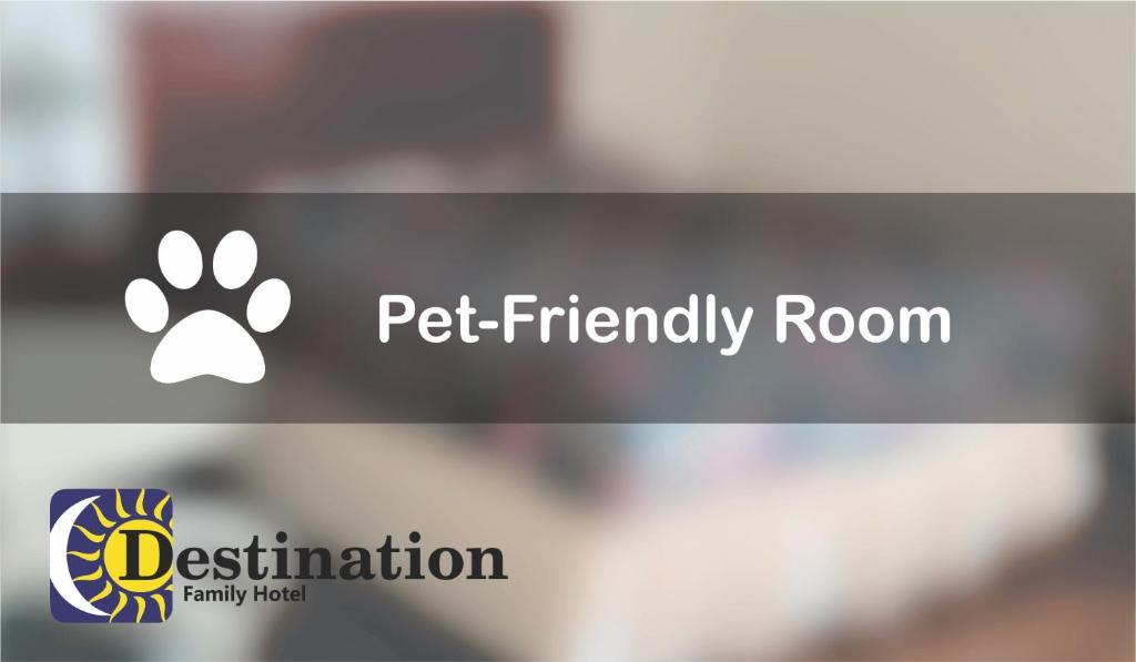 a close up of a pet friendly room sign at Destination Family Hotel in Whitehorse